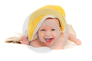 A happy satisfied baby, toddler, newborn, baby covered with a towel after bathing, hygiene in babies, healthy sleep conception, co