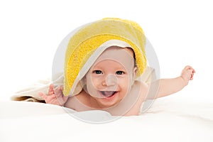 A happy satisfied baby, toddler, newborn, baby covered with a towel after bathing, hygiene in babies, healthy sleep conception, co