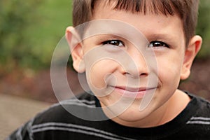 Happy school child joyful face photo