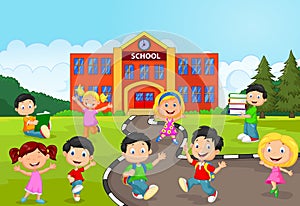 Happy school children cartoon in front of school
