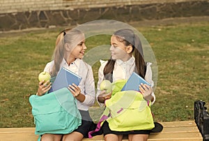 Happy school friends little girls having fun, school break concept