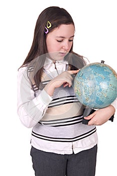 Happy school girl holding globe