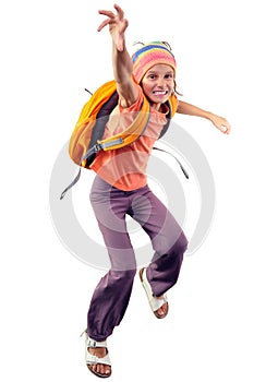 Happy schoolgirl or traveler exercising, running and jumping