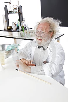 Happy scientist in lab ready to explain ideas