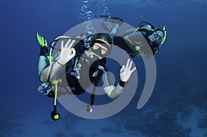 Happy scuba divers