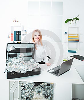 Happy secretary business woman holding dollar money. Accounting, credit score concept.