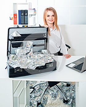 Happy secretary business woman holding dollar money. Accounting, credit score concept.