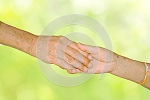 Happy Senior Adult Couple Holding Hands together