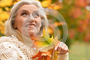 happy senior beautiful woman in park