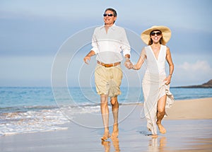 Happy senior couple on the beach. Retirement Luxury Tropical Res