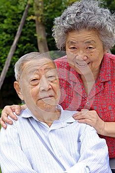 A happy senior couple embraced