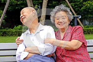 A happy senior couple embraced