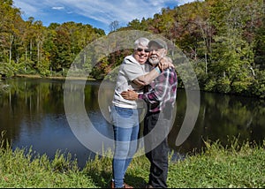 Happy Senior couple embracing and smiling still in love after all the years