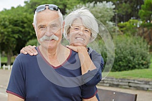 happy senior couple enjoying their time in park