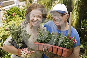 Happy Senior Couple Gardening Together