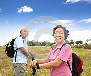 Happy Senior couple hiking