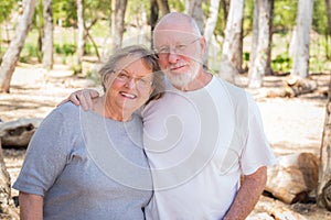 Happy Senior Couple Hiking Outdoors