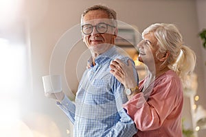 Happy senior couple at home