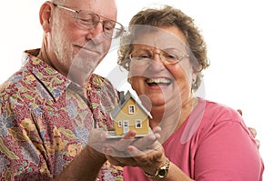 Happy Senior Couple & Home