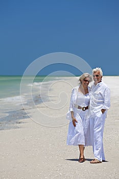 Happy Senior Couple Laughing on Tropical Beach