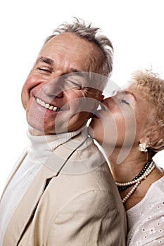 Happy senior couple in love. Close-up portrait of a happy senior couple looking at each other.