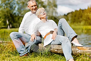 Happy senior couple outdoors in spring