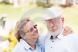 Happy Senior Couple Portrait Outside In Park