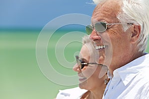 Happy Senior Couple By the Sea on A Tropical Beach