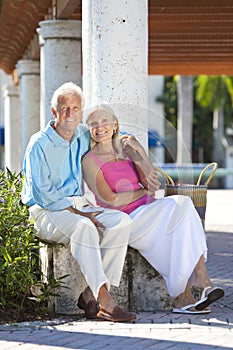 Happy Senior Couple Smiling Outside in Sunshine