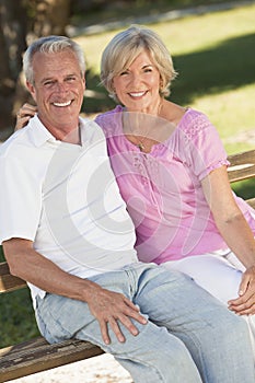 Happy Senior Couple Smiling Outside in Sunshine