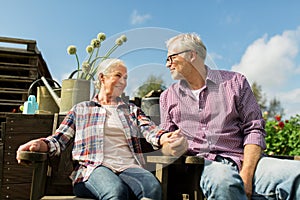 Happy senior couple at summer farm