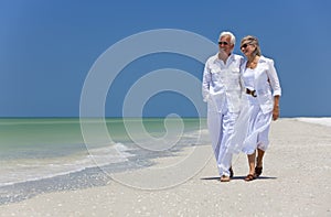 Happy Senior Couple Walking on A Tropical Beach