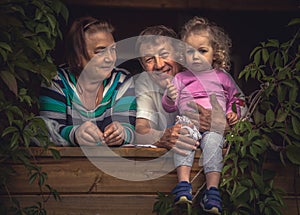 Happy senior grandparents grandchild together potrait happy grandparenting concept