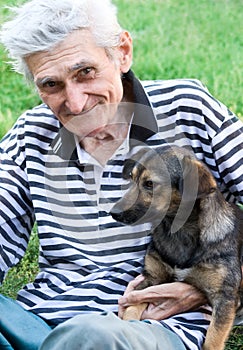 Happy senior with his best pal dog