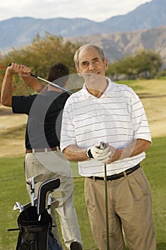 Happy Senior Male Golfer
