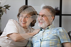 Happy senior married couple home candid portrait