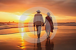 Happy senior retired couple walking a beach