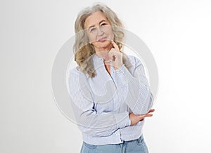 Happy senior woman with crossed arms isolated on white background. Positive elderly seniors life living and european old beauty