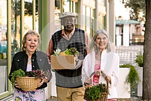 Happy Seniors Returning from Farmers Market with Groceries