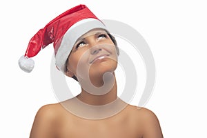 Happy Sensual Brenette Woman in Santa Hat Looking up