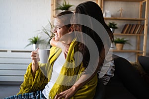 Happy sensual couple in love drinking morning coffee together