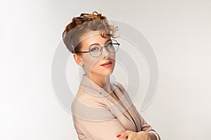 Happy serious young beautiful happy business woman looking at you isolated yellow background wall. Closeup confident lawyer