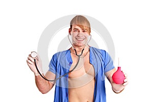 Happy doctor with stethoscope and enema photo