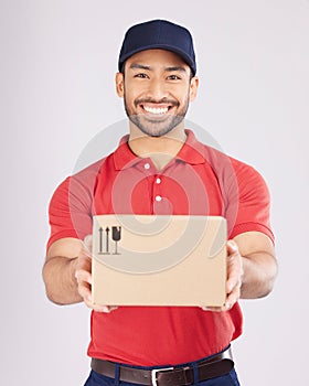 Happy, shipping box or portrait of delivery man in studio with courier service, supply chain package or smile. Asian