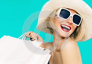 Happy shopping summer lady on blue background