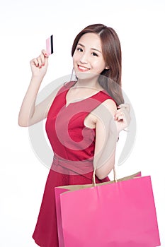 Happy shopping young woman