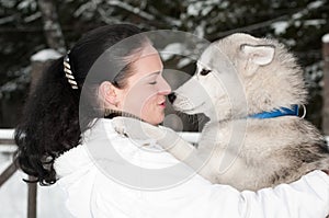 Happy siberian husky owner with dog