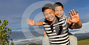 Happy sibling playing outdoor