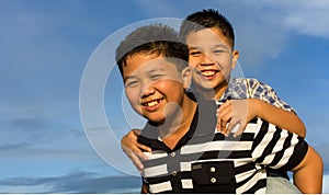 Happy sibling playing outdoor