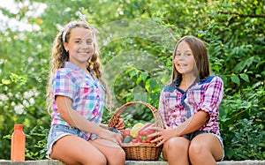 Happy sisters garden. Organic harvest. Farm market. Selling homegrown food concept. Girls cute children farming. Kids
